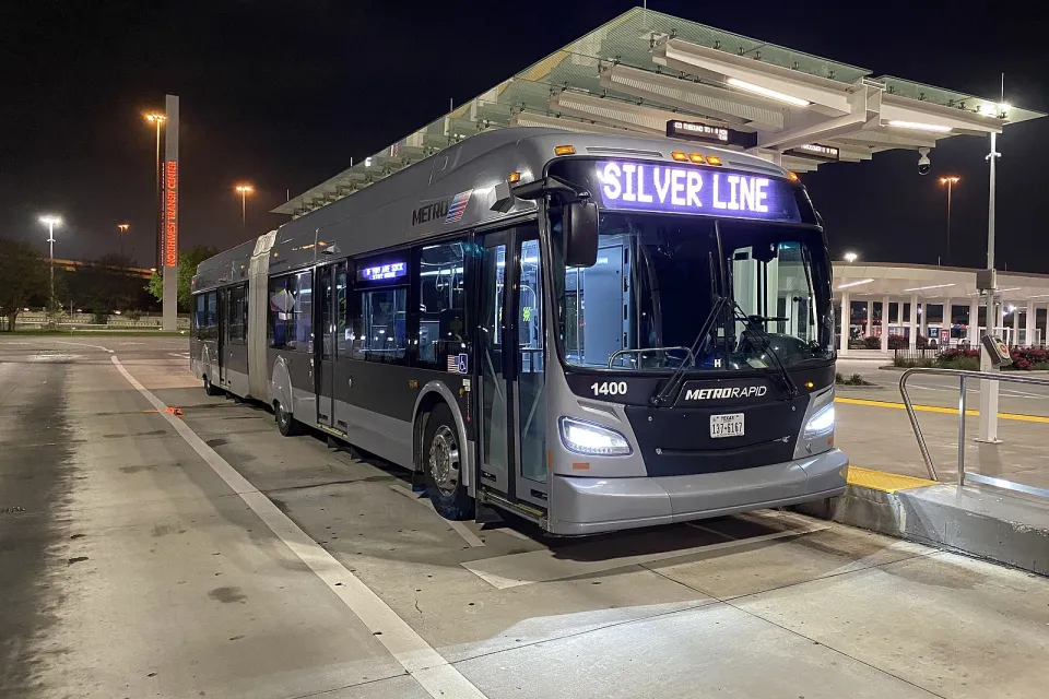 Silver Houston Silver Line bus at a dedicated bus rapid transit station